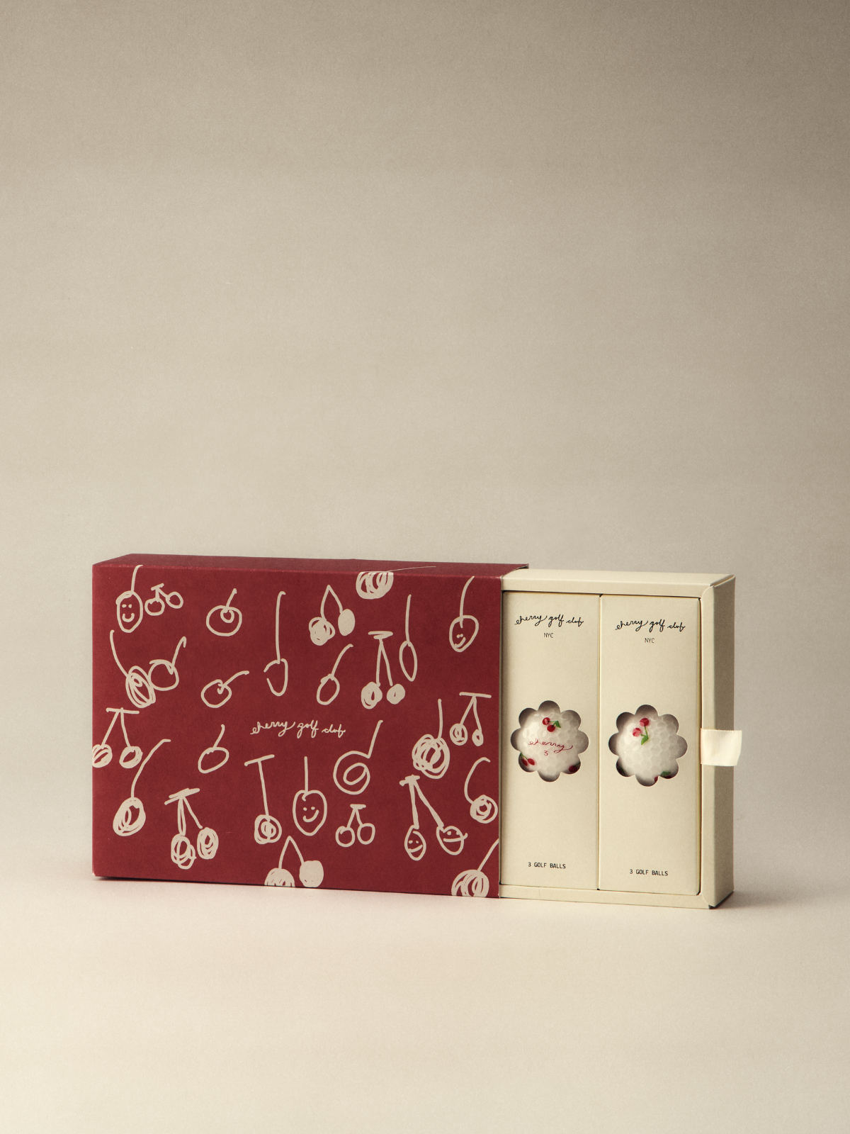 Golf ball gift box set with cherry print design, Cherry Golf Club, box and sleeve packaging