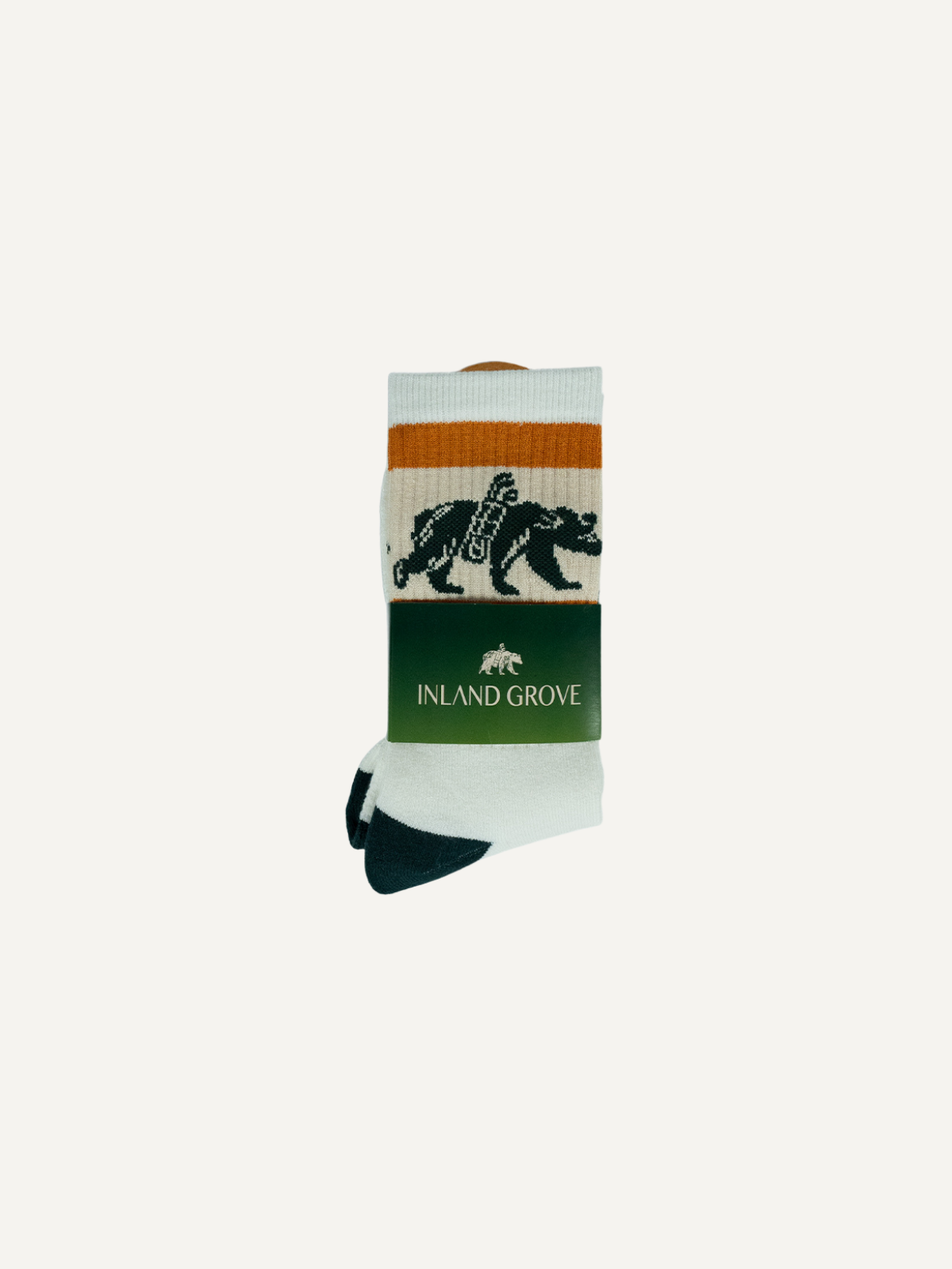 Golf crew socks in white, with beige and orange stripe design and bear graphic, Inland Grove, front view