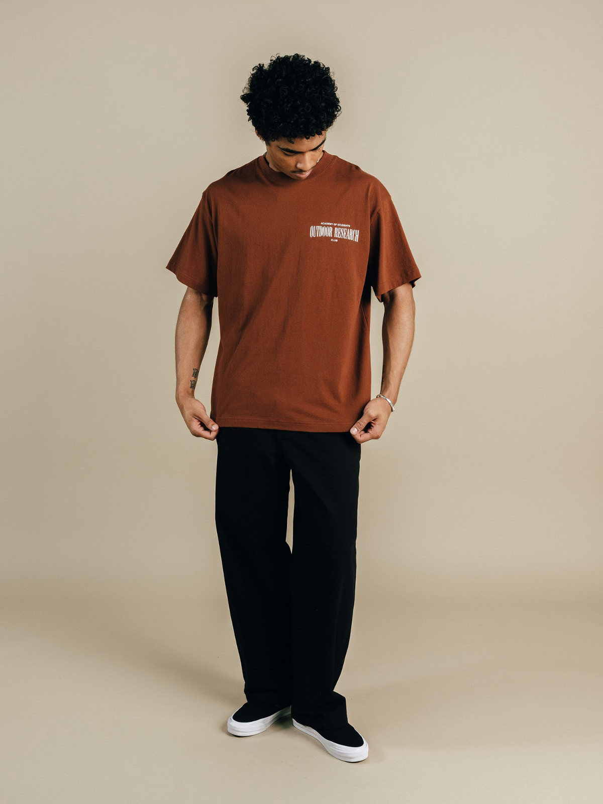 Brown Outdoor Research T-shirt with chest graphic, Students Golf, full front view