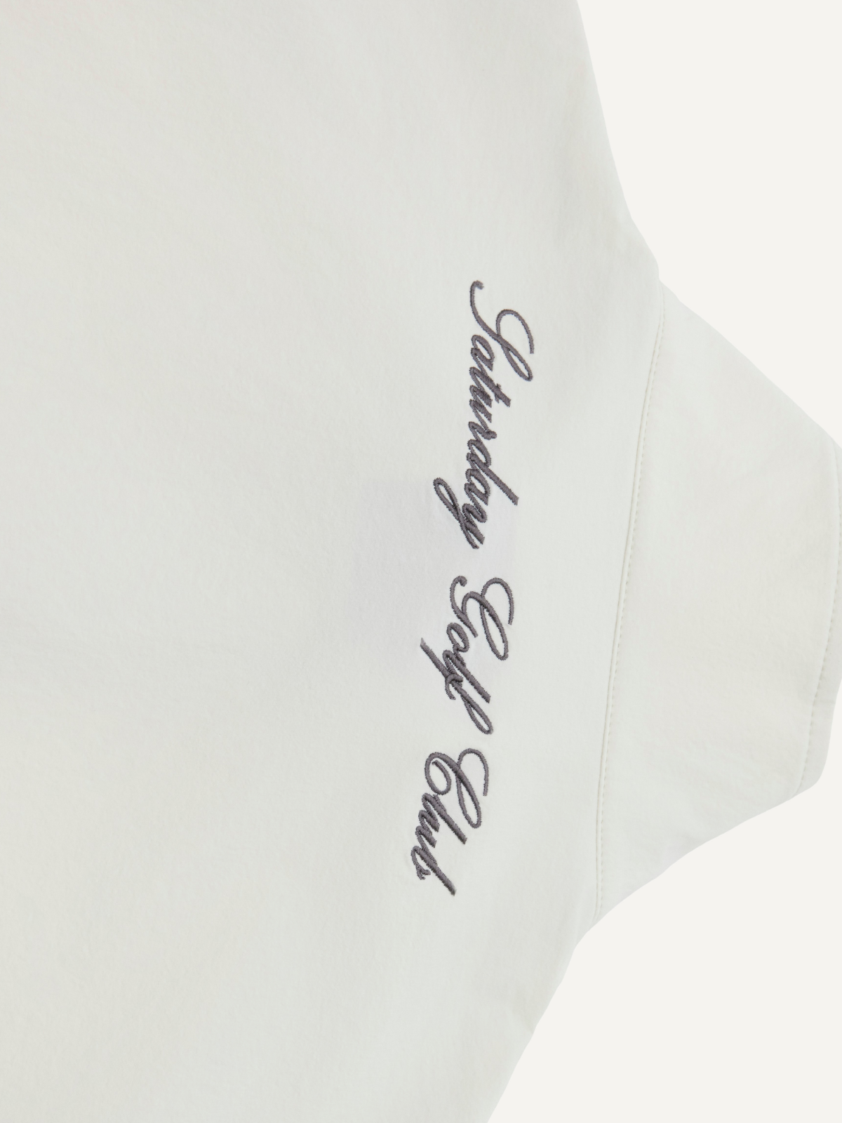 Women’s cream golf windbreaker half-zip sleeve logo detail, Khalhon