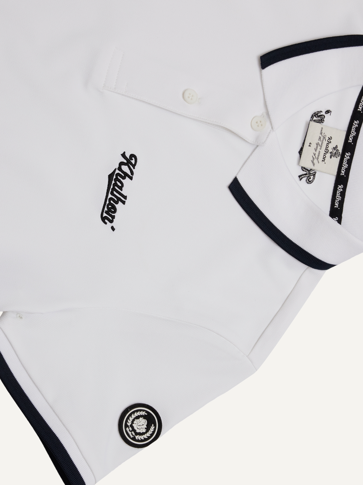 Women’s white golf polo with embroidered logo and white contrast collar detail, Khalhon