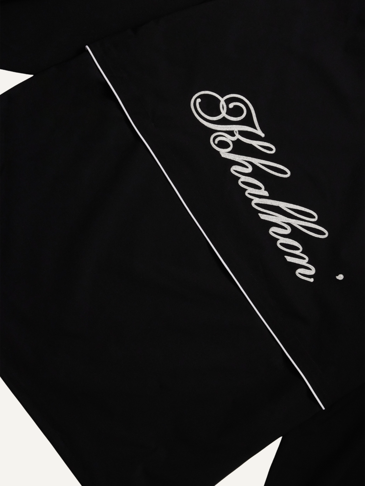 Unisex black long sleeve jersey script logo detail with panel design, men’s sizing