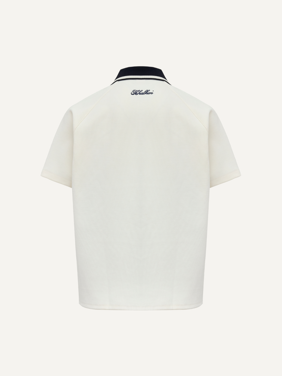 Unisex cream top with navy panel detailing, men’s sizing, back view
