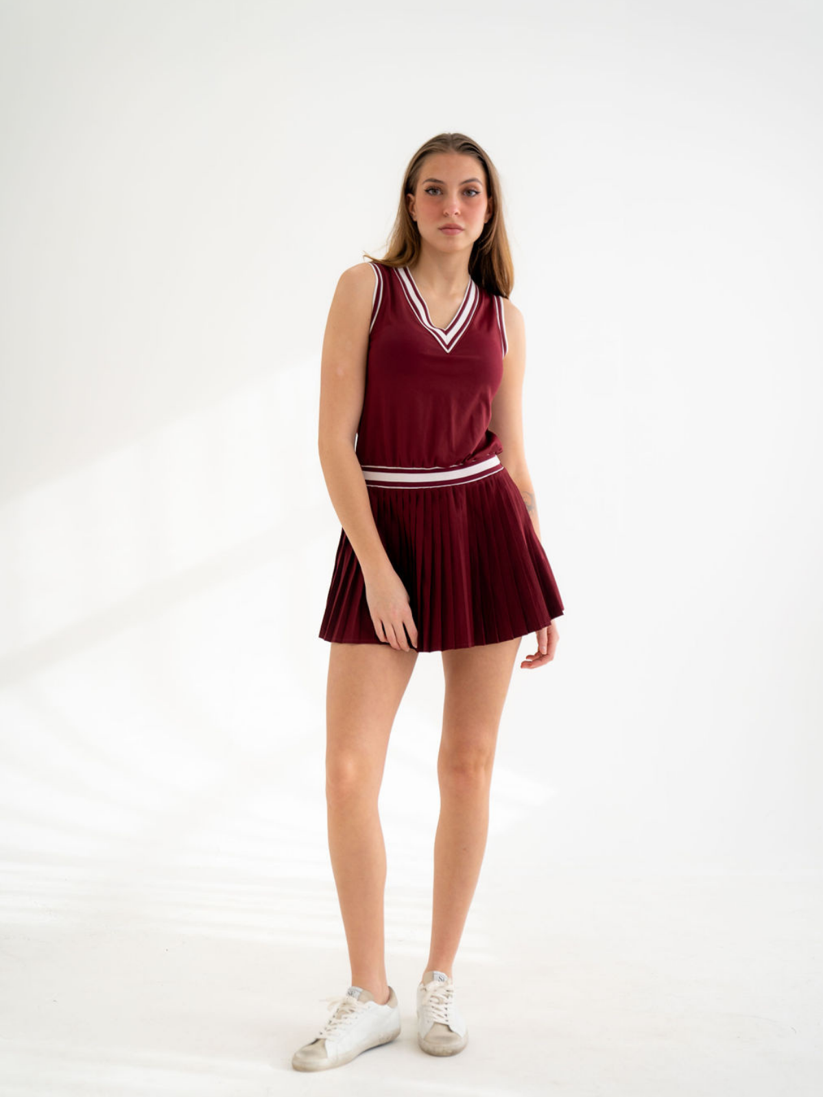Burgundy dress with pleated skirt and contrast trim, Never a Wallflower, front view