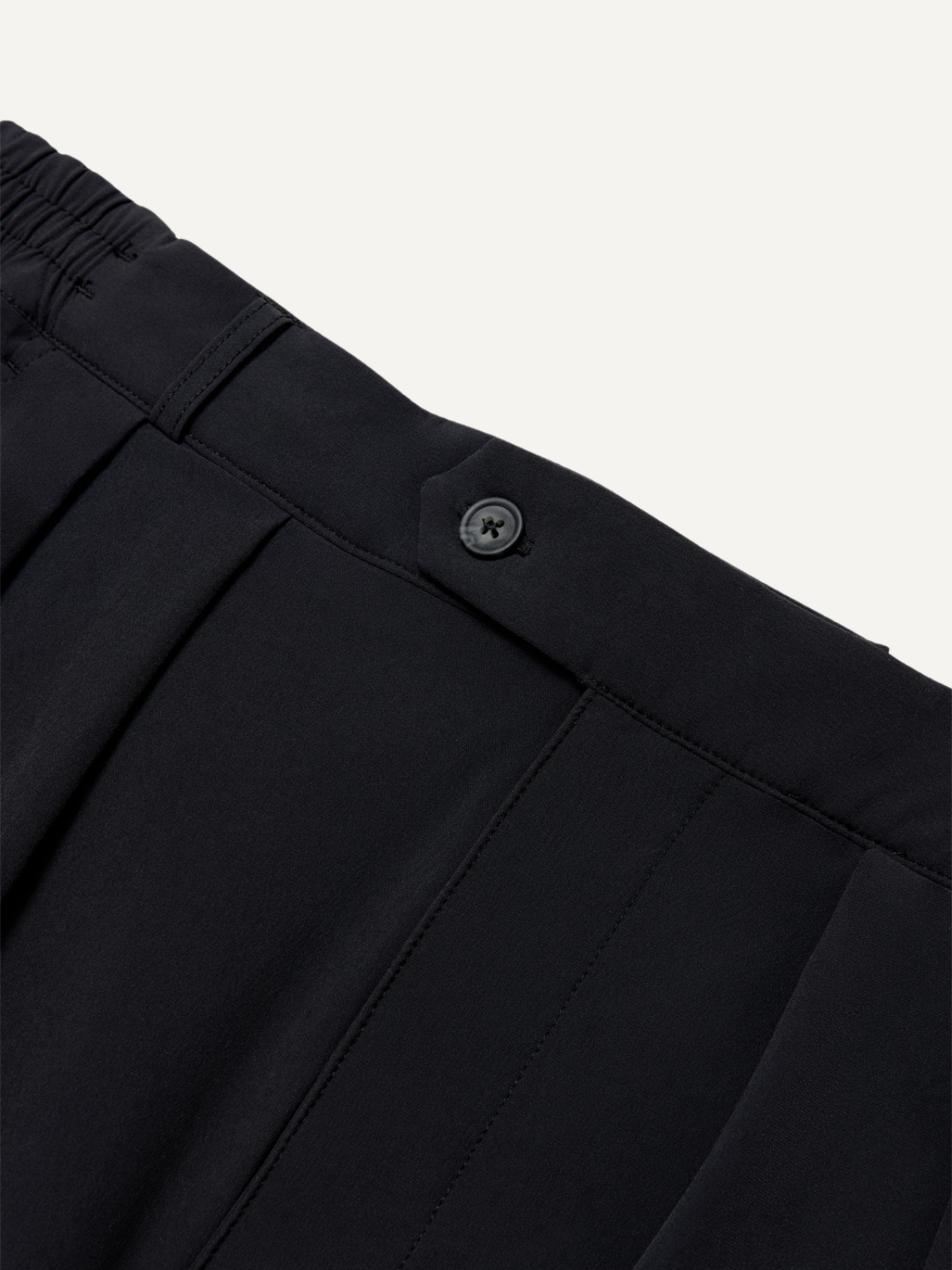 Black golf pants with pleated waist and button fastening detail, Public Drip