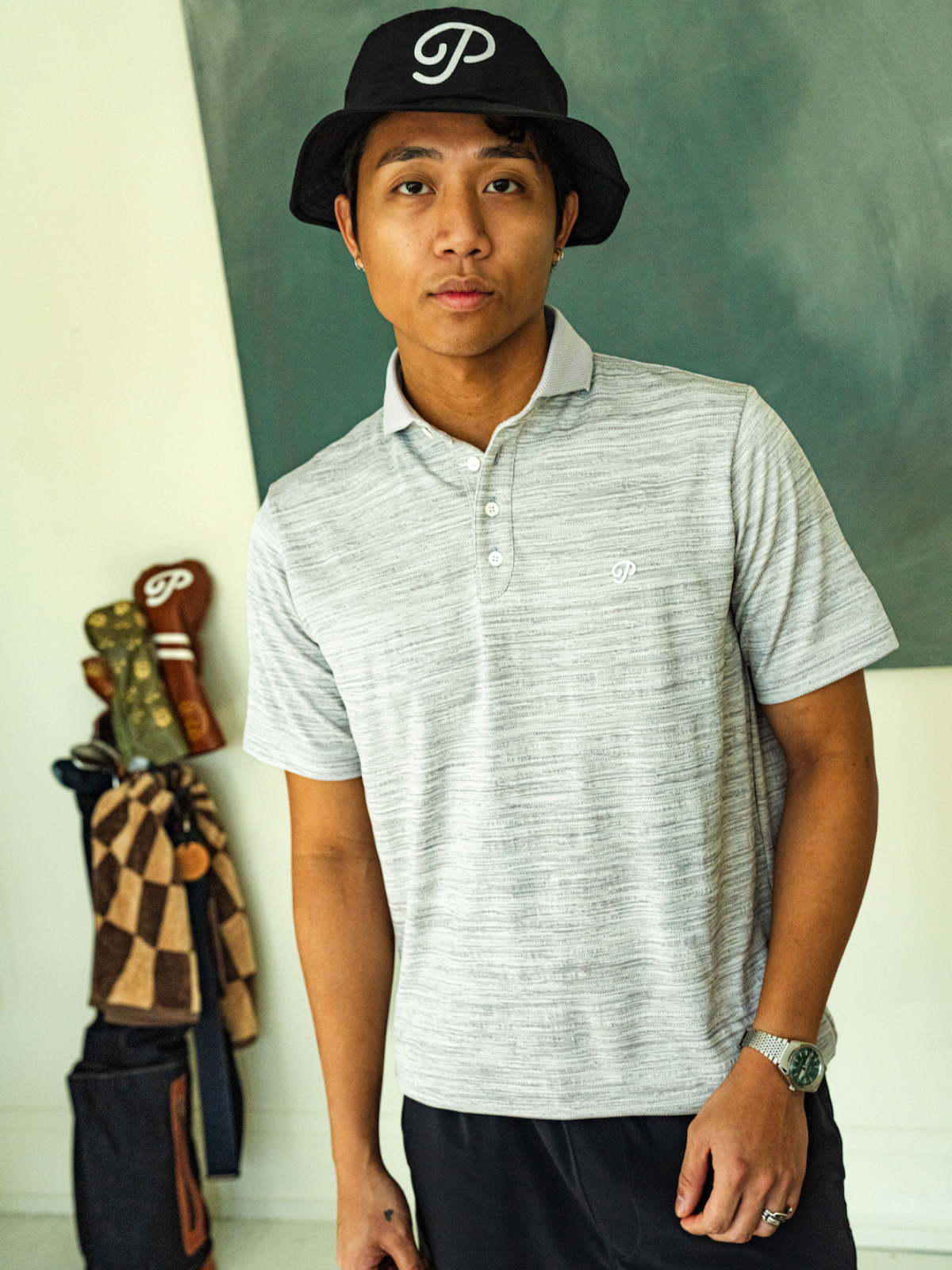 Grey performance polo with textured finish and classic fit, Public Drip, model view