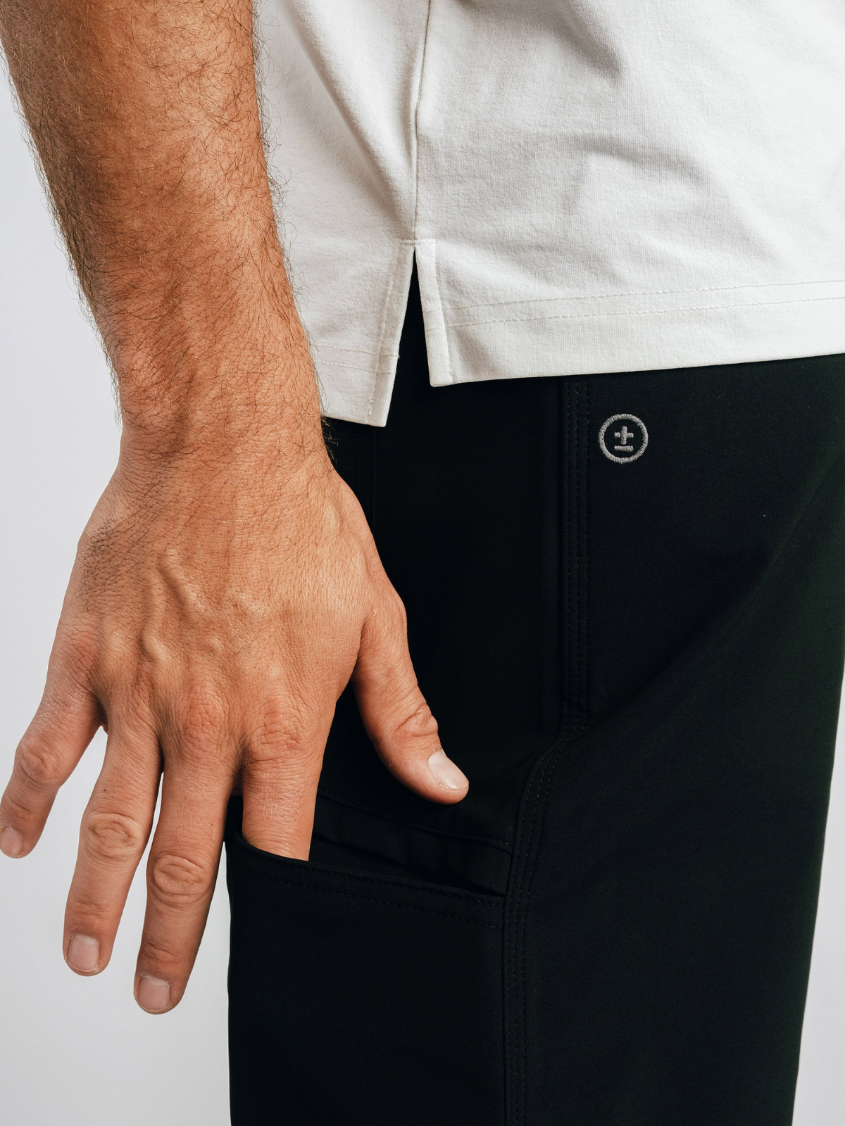 Black Alpina Performance Shorts with side pocket, Students Golf, pocket detail