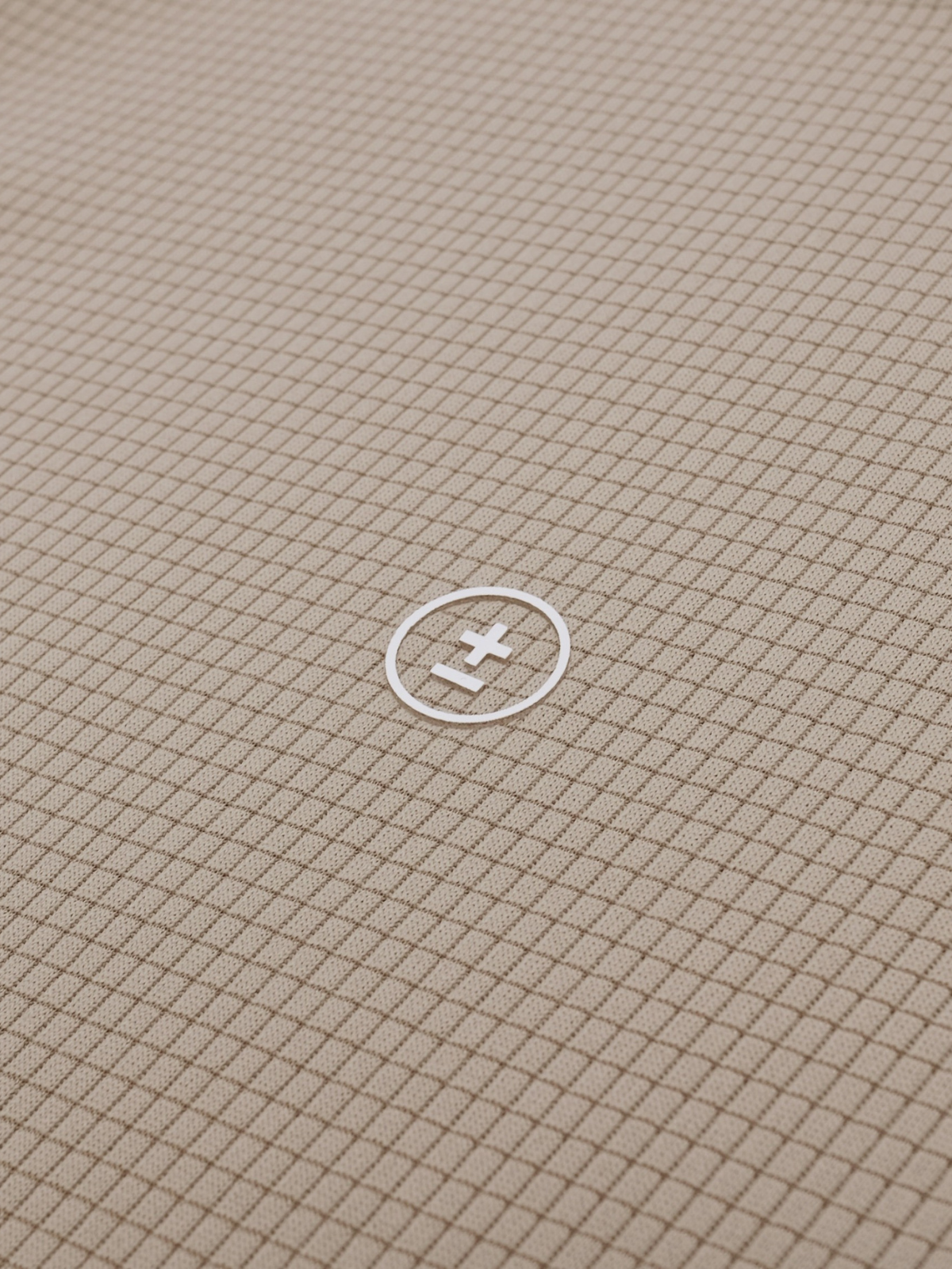 Beige Librarian Polo with embroidered logo and textured weave, Students Golf, fabric detail