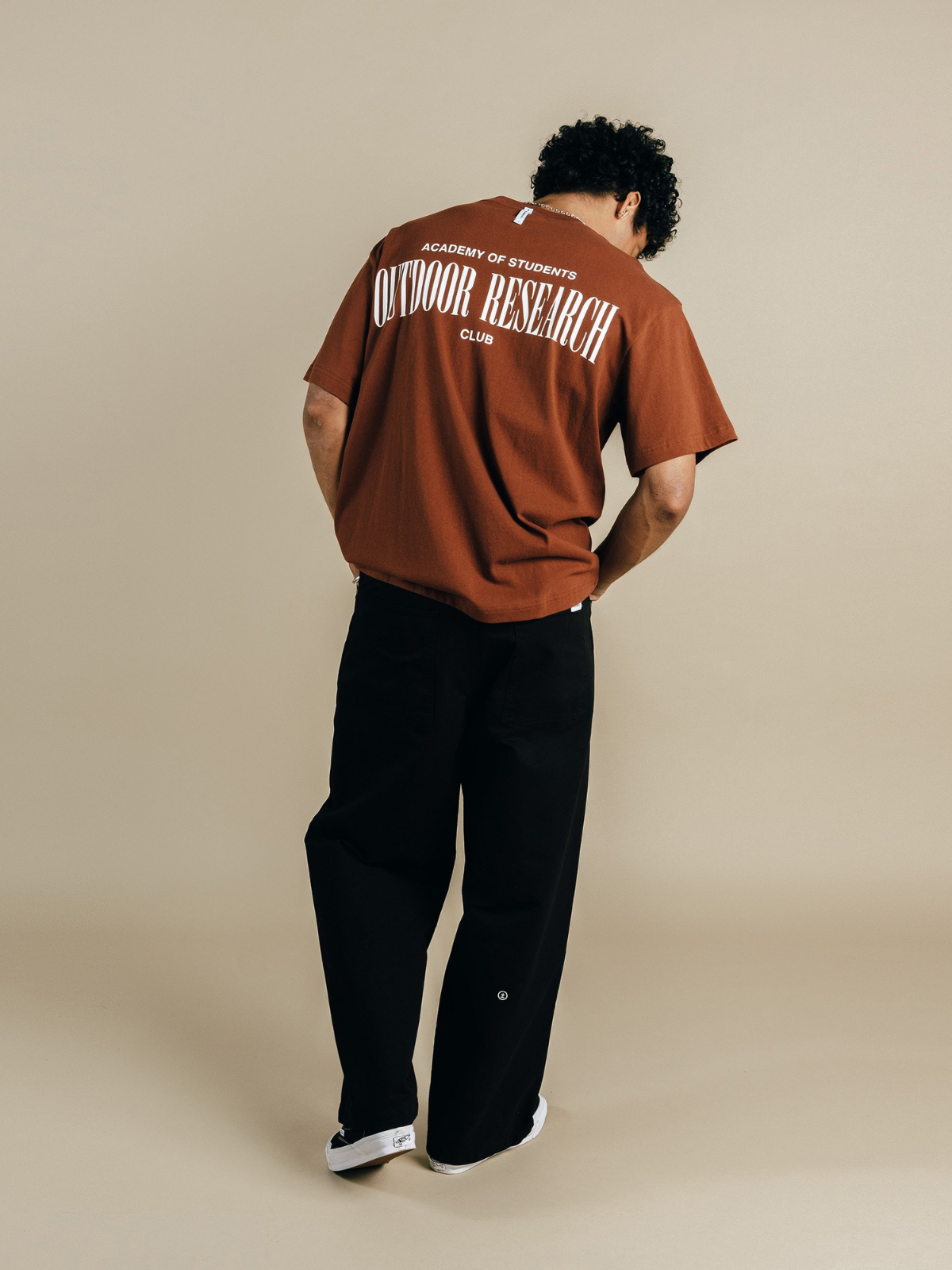 Brown Outdoor Research T-shirt with back graphic, Students Golf, back view